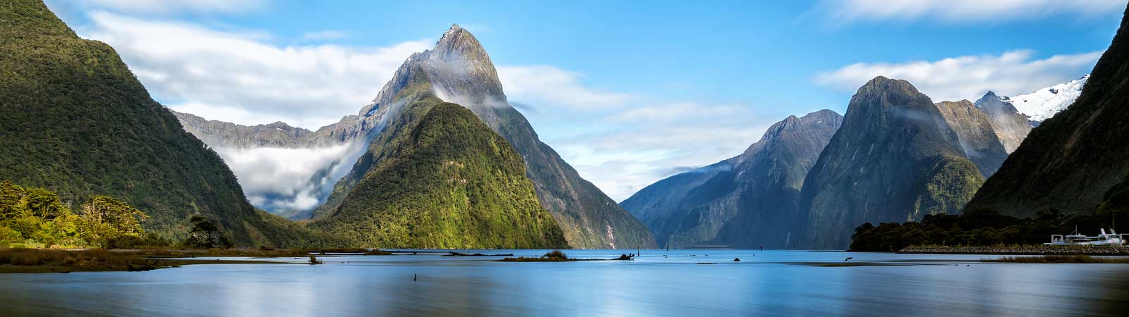 Stunning view of the glacier-carved fiords that can be explored on a New Zealand vacation